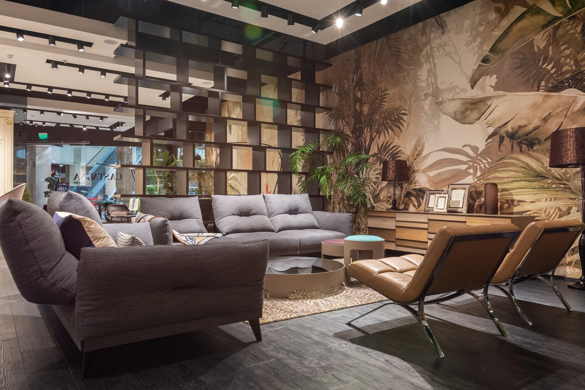Area living con divani e poltrone